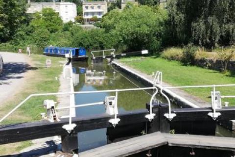 Widcombe Lock with barge approaching